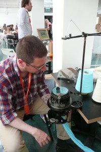 Maker Faire Brighton Tom with Sock knitting machinev20130907 0306 PMS